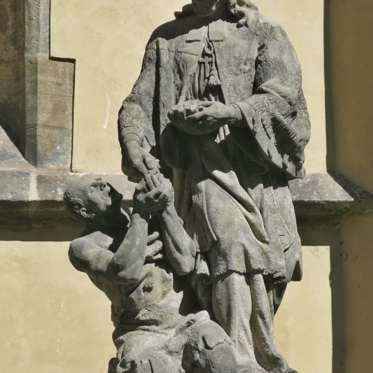 Praha (Staré Město) – sousoší sv. Jana Nepomuckého almužníka
